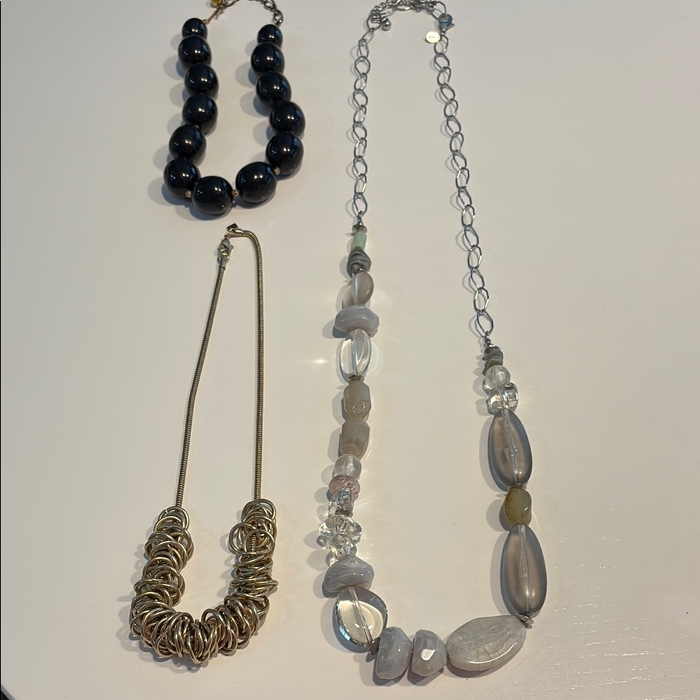 Black and Silver Necklace Collection with Unique Bead Designs
